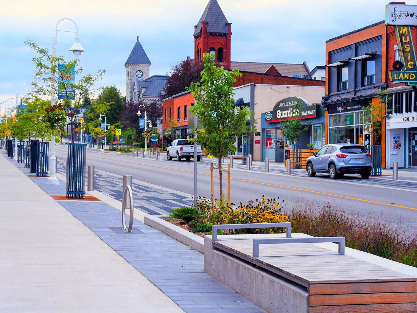 Revitalized downtown streetscape with new sidewalks and planters